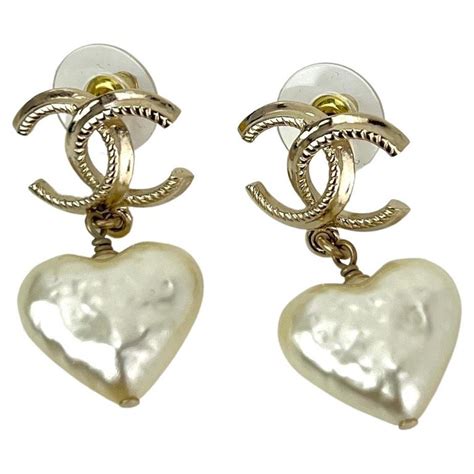 chanel white heart earrings|chanel earrings price list.